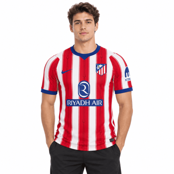 ba3877d2-0b49-41a5-b26b-e743a731a670 - UAE SPORT STORE Atlético Madrid home jersey 2026/27 with red and white vertical stripes and club crest.