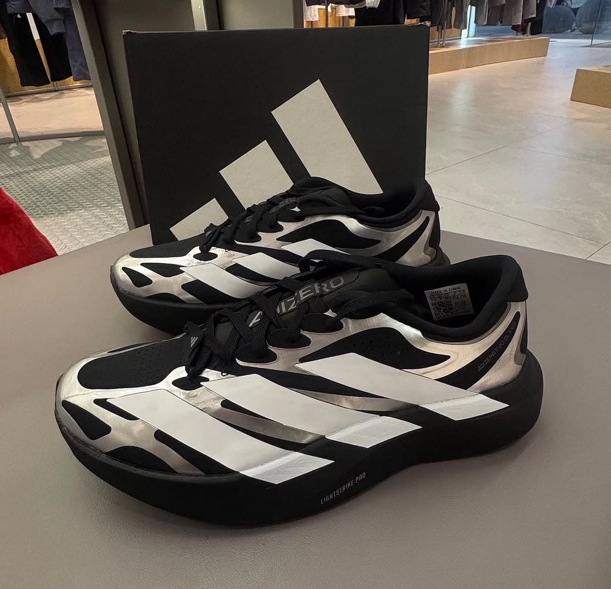 c5206f83-f66f-4037-b197-e6ed1d32ef72jpg | UAE SPORT STORE adidas Adizero EVO SL EXO Black White Silver