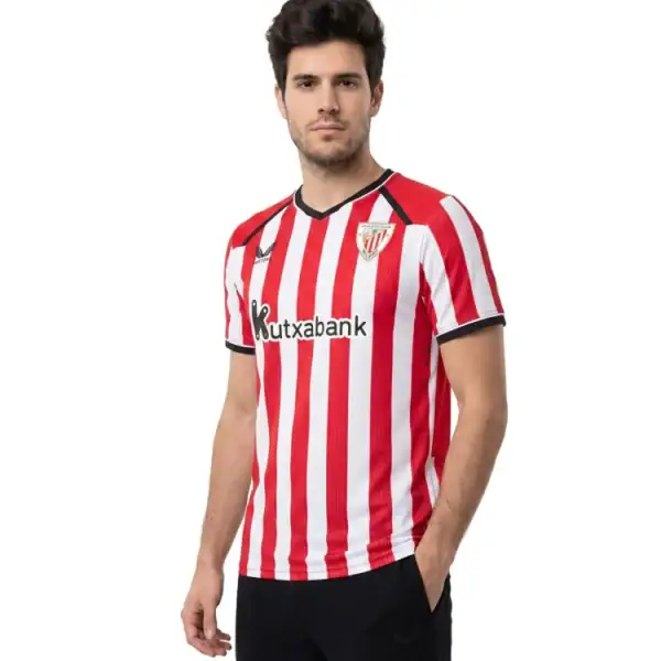 camiseta-castore-athletic-club-bilbao-primera-equipacion-2026-2027-red-0 - UAE SPORT STORE Athletic Bilbao home jersey 2026/27 with red and white vertical stripes.