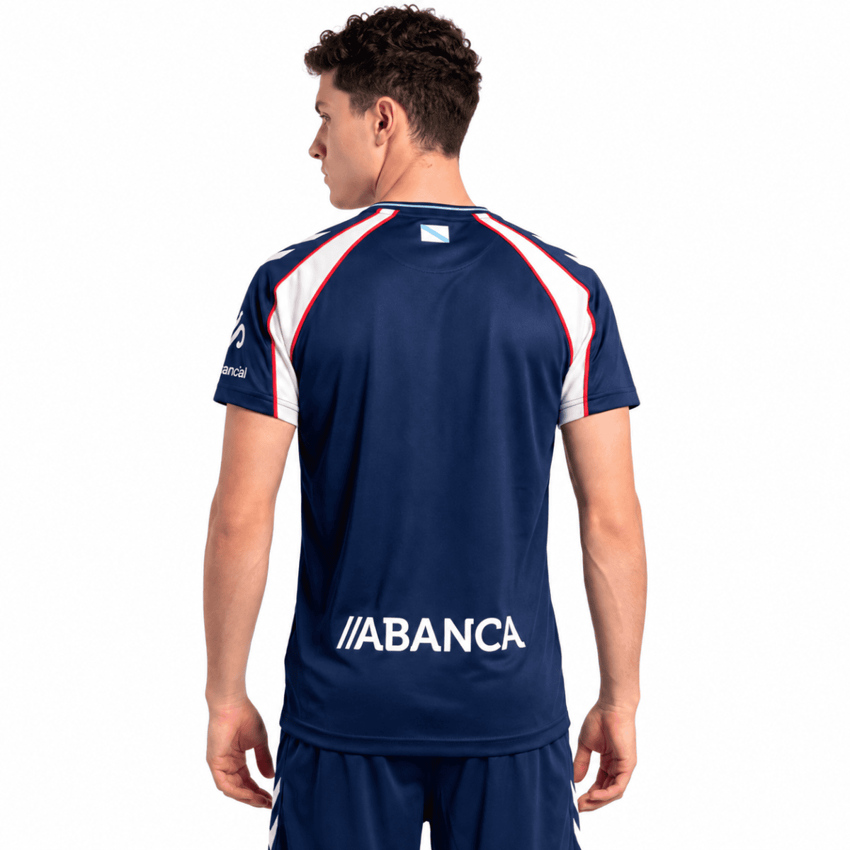 Celta Vigo away football jersey with blue, white, and red accents, back view.