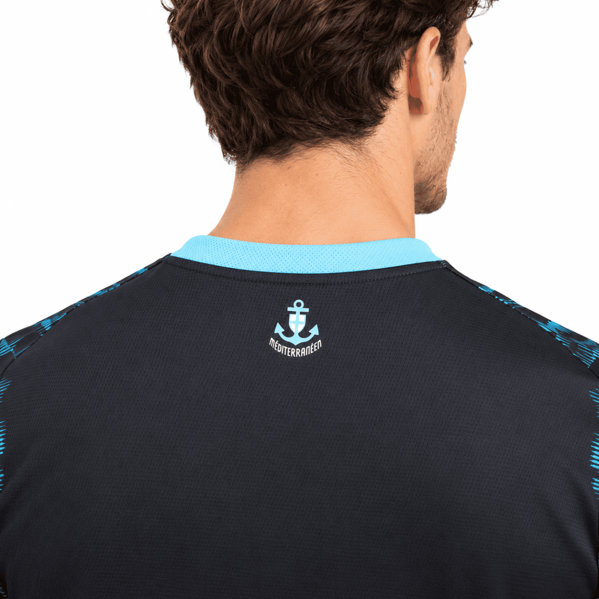 Back of Marseille away jersey 2026/27 with anchor logo and blue accents.
