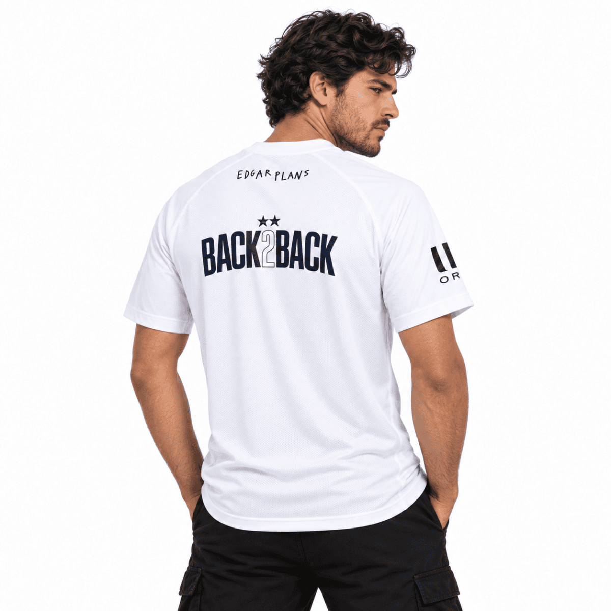 Man wearing white PSG jersey with 'BACK 2 BACK' text on back, season 2026/27.