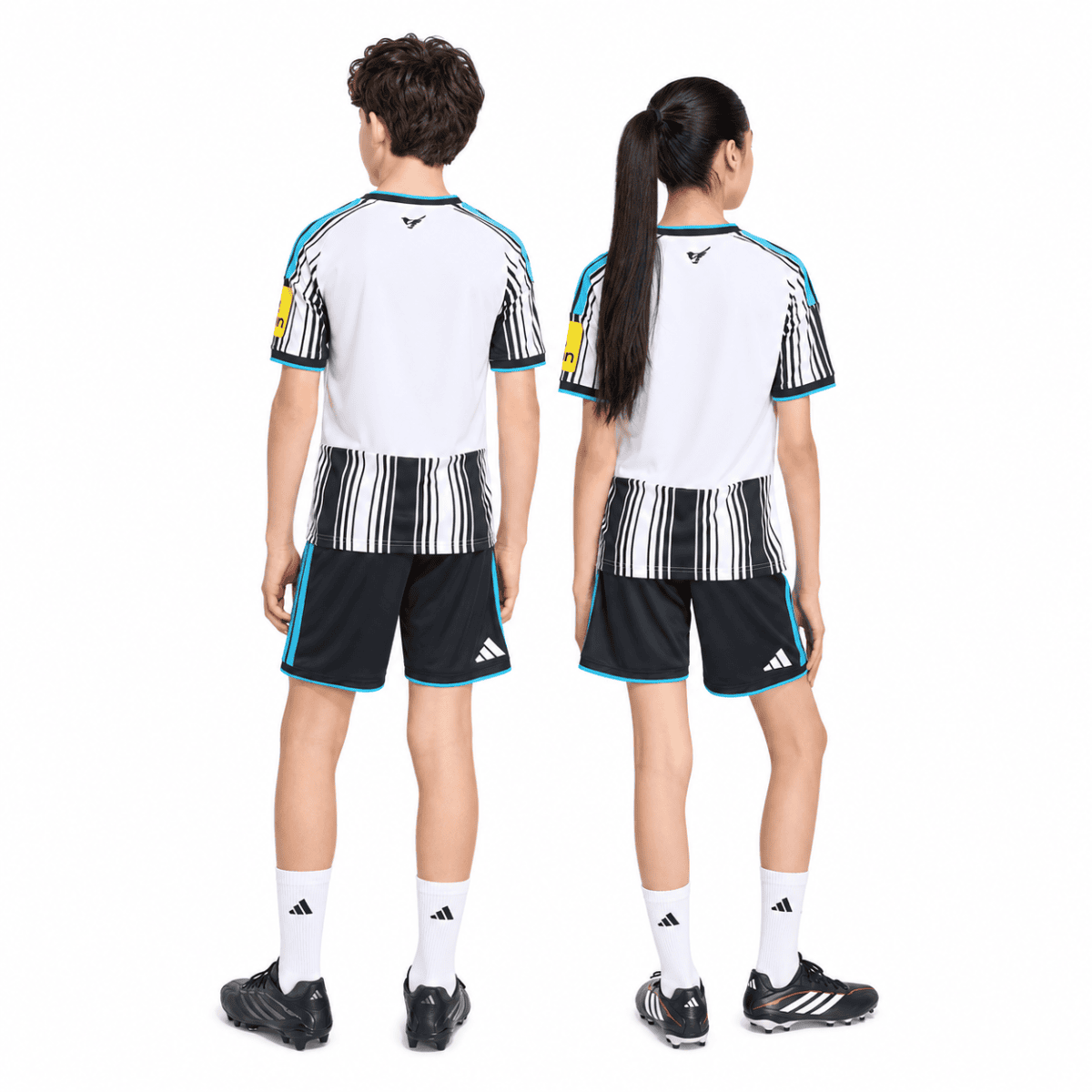 Kids football kits with black, white, and blue colors, back view, for Newcastle 2026/27 season.