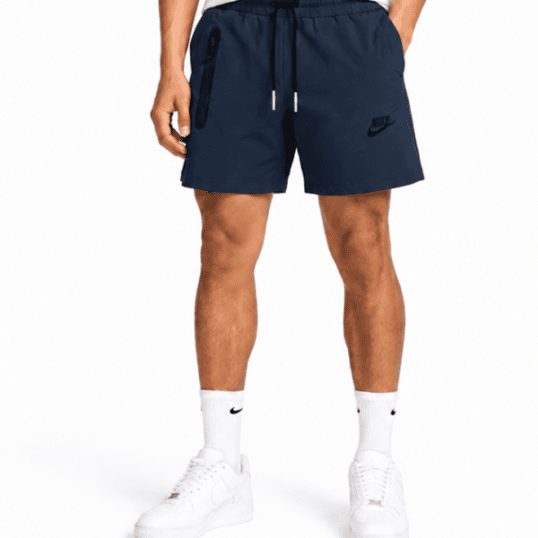 Nike navy essential swim shorts with logo and drawstring waist.