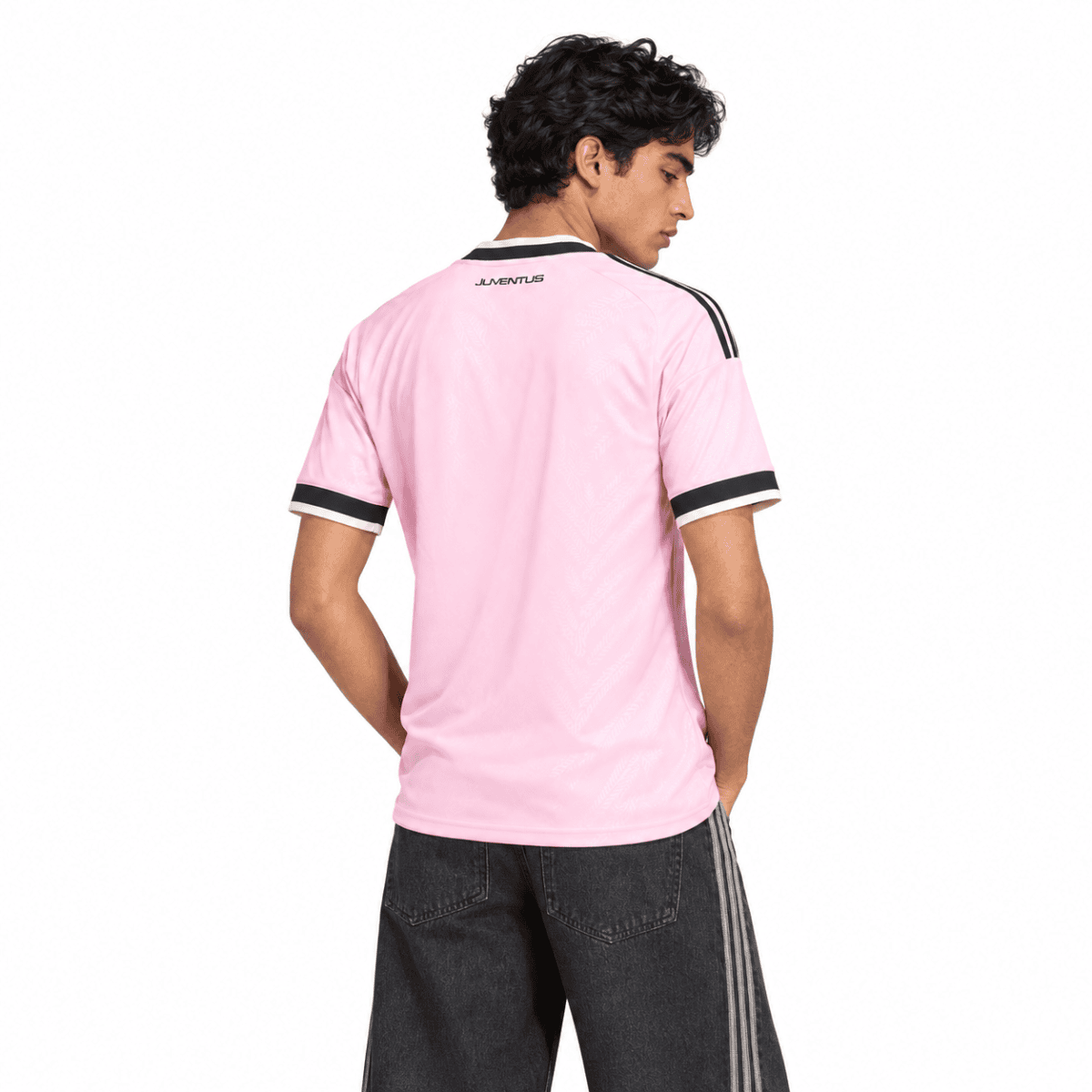 Juventus away jersey 2026/27 in pink with black and white accents.