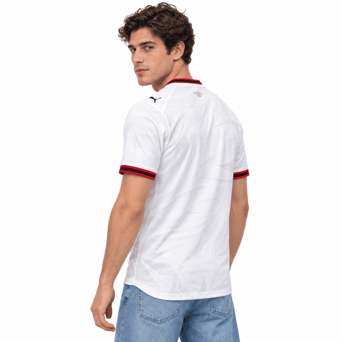 AC Milan away jersey 26/27 with white color and red and black accents.