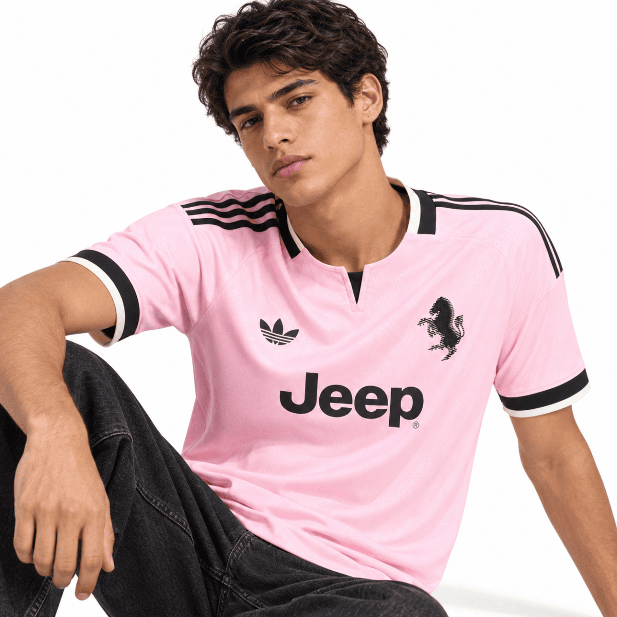 Juventus away jersey 2026/27 pink with black accents and club logos.