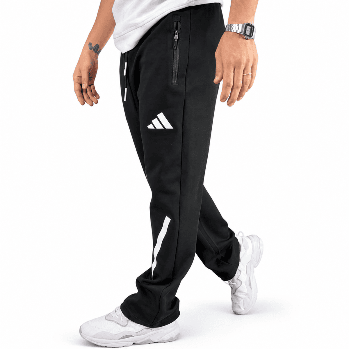 Black Adidas cotton training pants with white logo and side stripe.