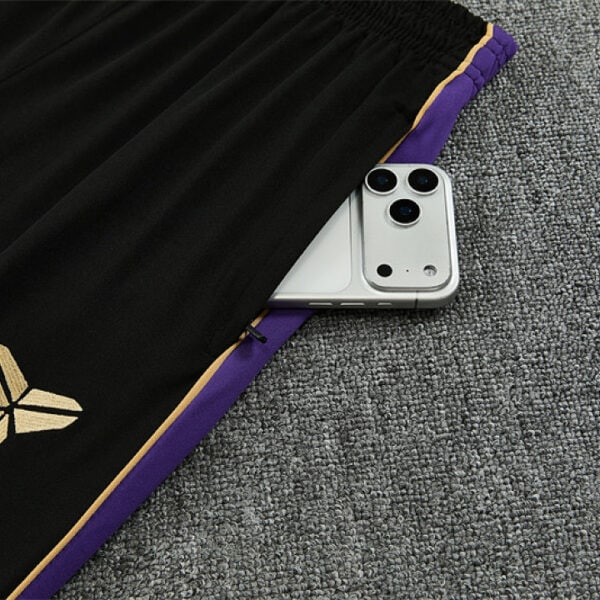 Barcelona black tracksuit pants 2026/27 gold emblem and side stripe