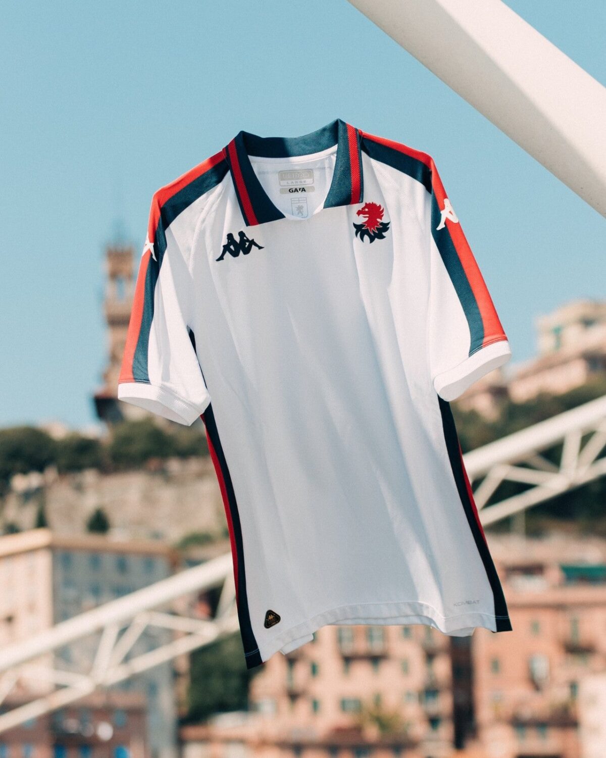 Genoa home football jersey 2024/25 season with white, red, and blue colors.