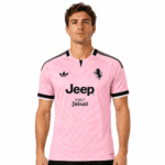 Juventus away jersey 2026/27 in pink with black accents and sponsor logo.
