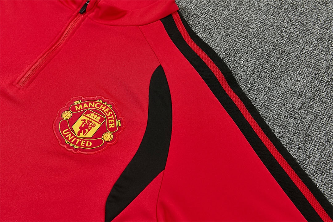 manchester-united-red-training-tracksuit-2027-07 | UAE SPORT STORE Manchester United Red Training Tracksuit 2027 - crest and sleeve detail