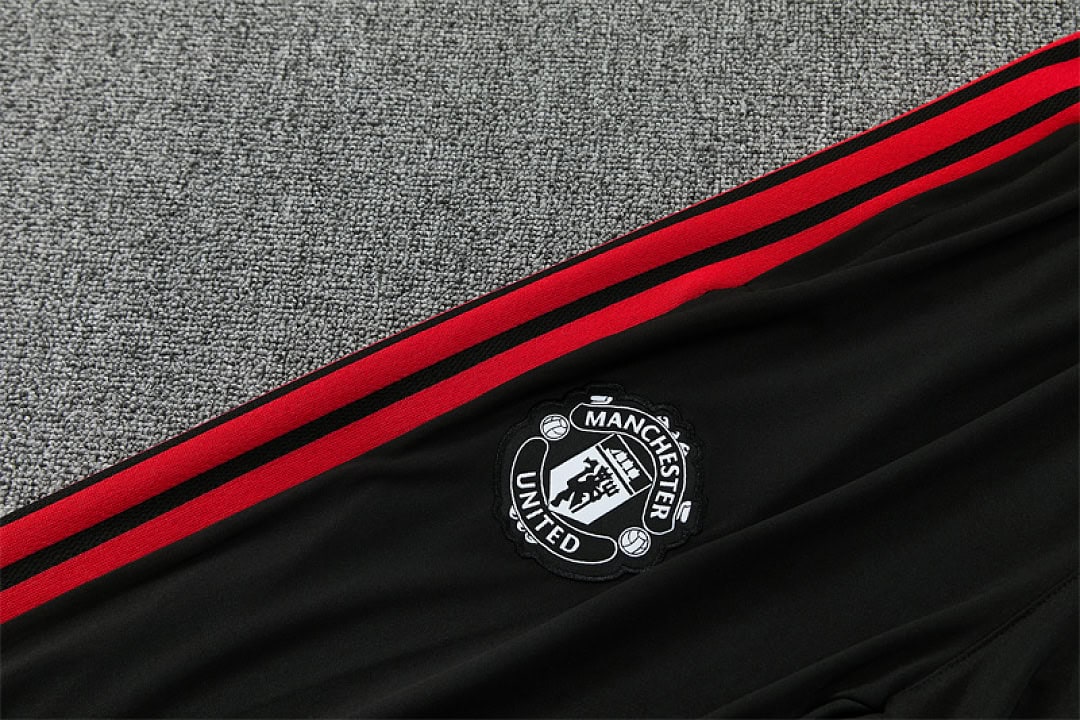 manchester-united-red-training-tracksuit-2027-11 | UAE SPORT STORE Manchester United Red Training Tracksuit 2027 - crest on track pants
