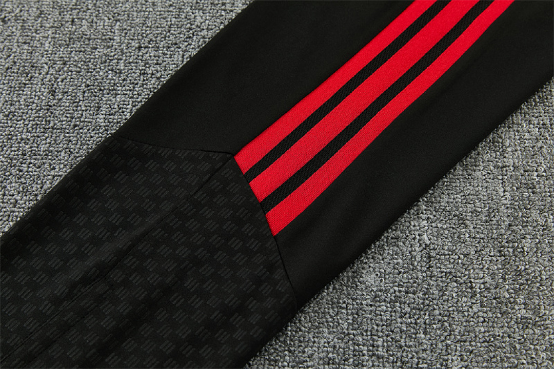 manchester-united-red-training-tracksuit-2027-14 | UAE SPORT STORE Manchester United Red Training Tracksuit 2027 - pants stripe and texture detail