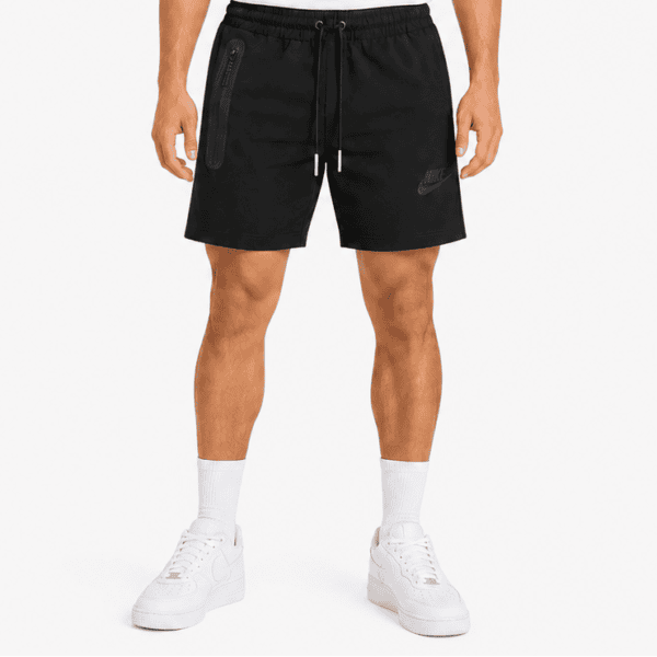 Nike black essential swim shorts with zip pockets and drawstring waist.