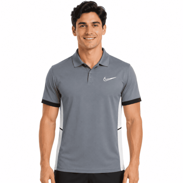Nike Grey Training Polo Shirt - UAE SPORT STORE Man wearing Nike grey training polo shirt with black accents.