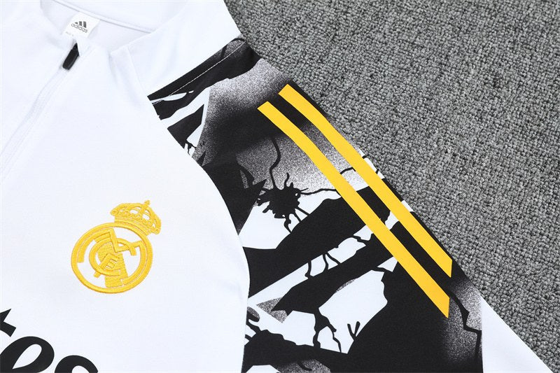 rm-marvel-white-black-quarter-zip-training-tracksuit-shoulder-printjpg | UAE SPORT STORE RM Marvel training tracksuit shoulder print detail