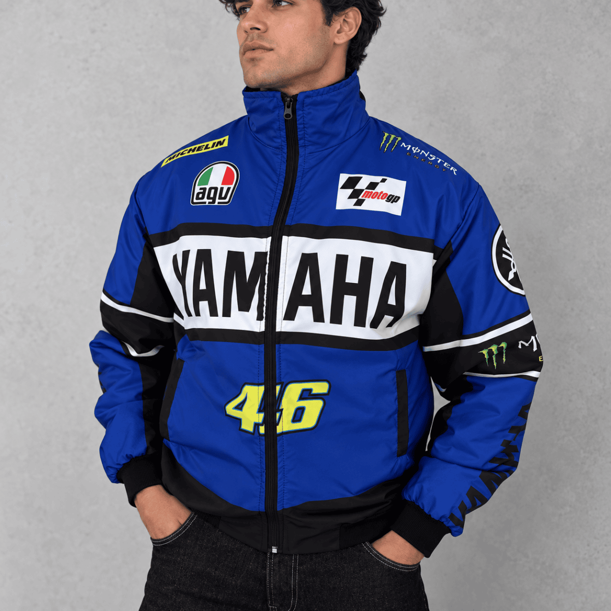 Yamaha racing jacket with Yamaha logo, number 46, and sponsor patches in blue, black, and white.