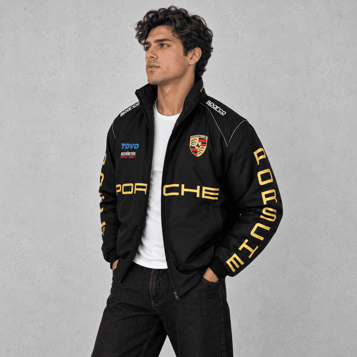 Porsche racing jacket with Porsche logo and yellow lettering on black fabric.