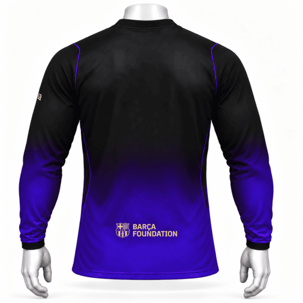 Rear view of the black-to-purple Barcelona long-sleeved shirt with gold BARCA FOUNDATION lettering near the hem.
