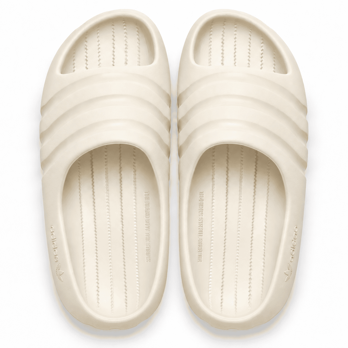 Cream adidas Adilette Ayoon Slides x Bad Bunny sandals for casual wear.