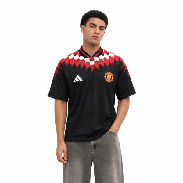 1 - UAE SPORT STORE Manchester United lifestyle football jersey with red, black, and white colors.