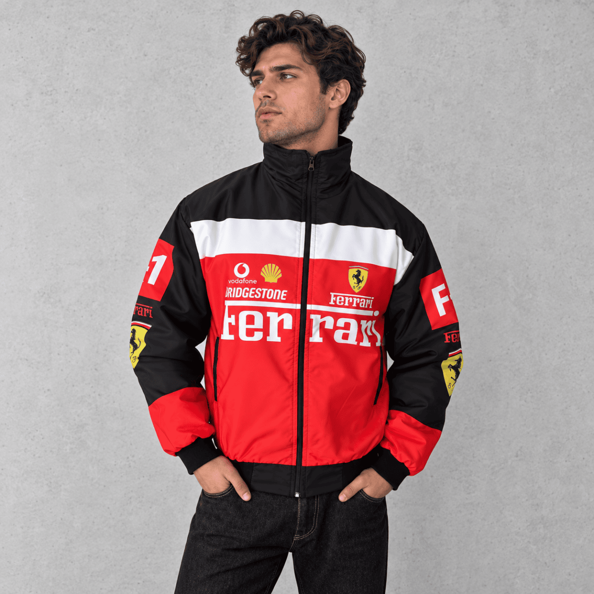 Ferrari Formula 1 team jacket with red, black, and white colors and sponsor logos.