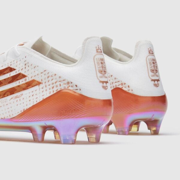 White and orange football cleats with iridescent sole for UAE national team.