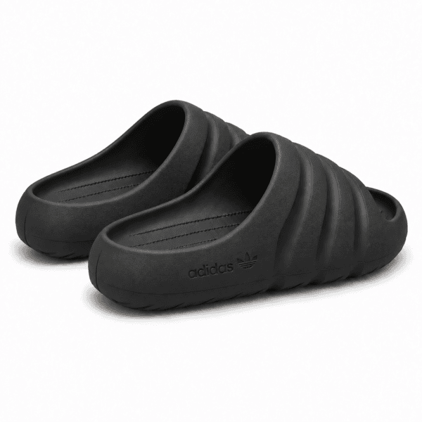 Black adidas Adilette Ayoon Slides x Bad Bunny slides for casual wear.