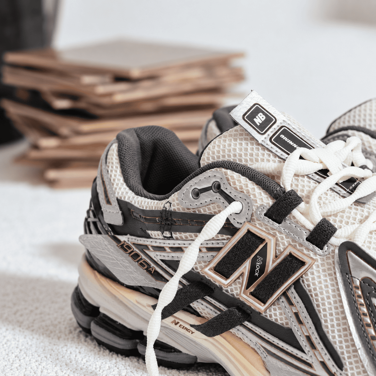 New Balance 1906 Mesh-Panel Sneakers in beige, black, and white colors.