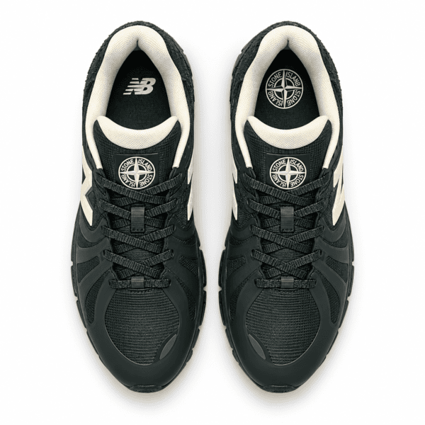 Black and white New Balance x Stone Island sneakers with logo details.