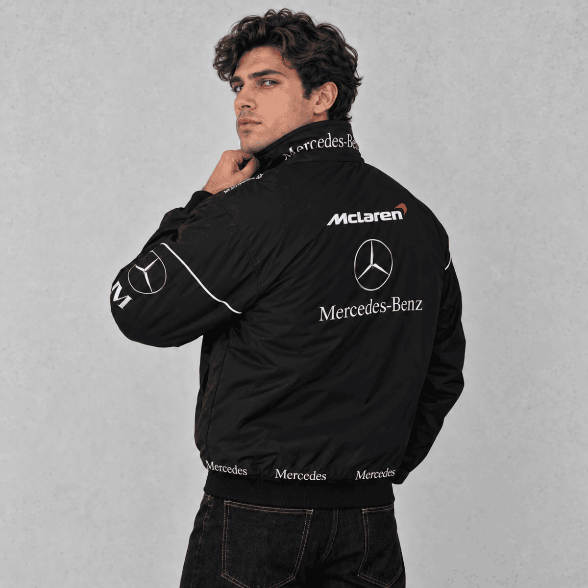 Black Mercedes-Benz branded jacket with logos on back and sleeves.