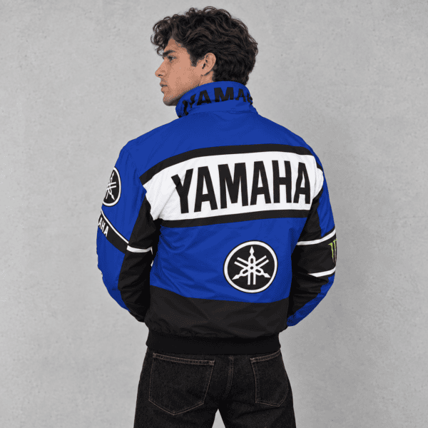 Yamaha racing jacket in blue, black, and white with Yamaha logo and branding.