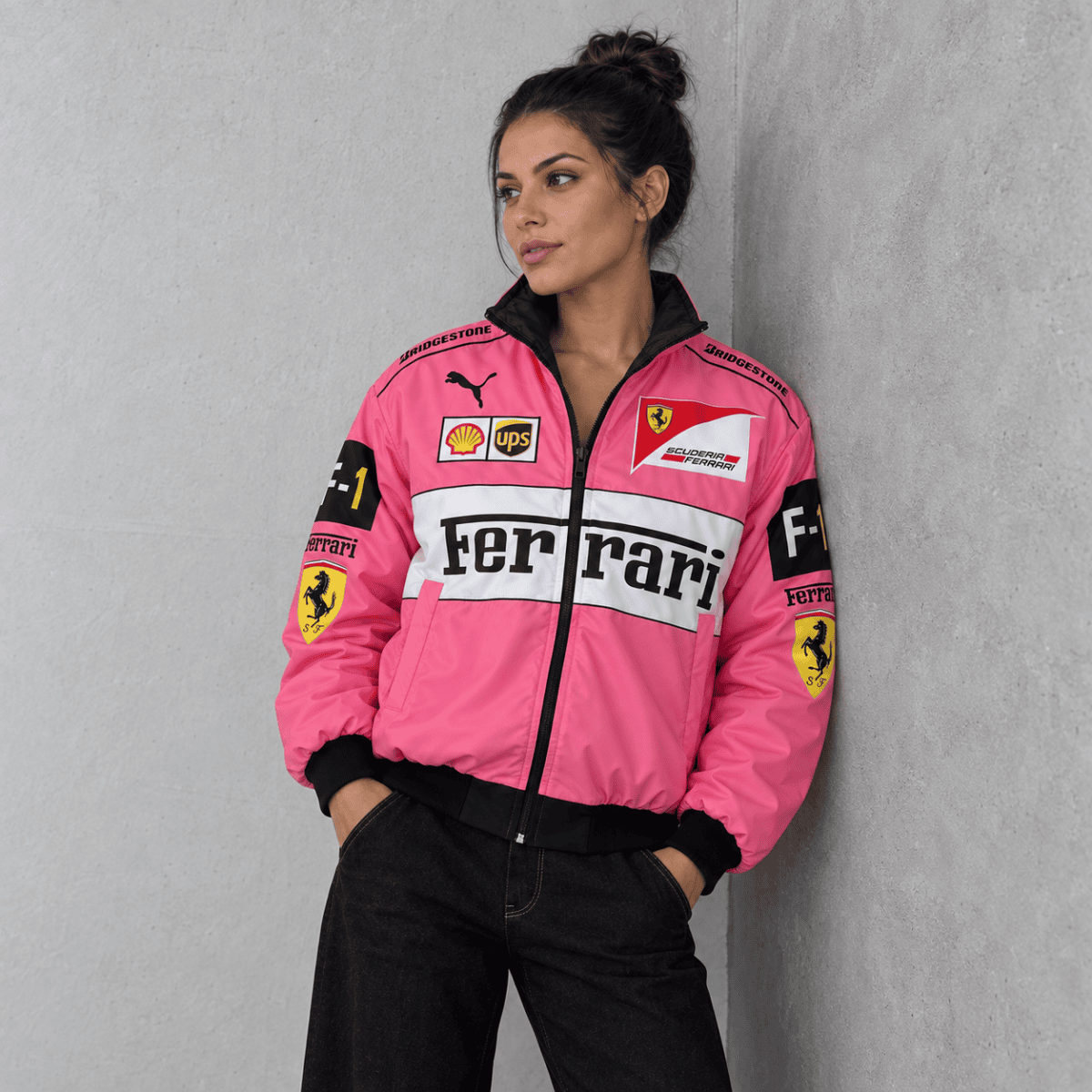 Pink Ferrari Formula 1 team jacket with sponsor logos and Ferrari badge.