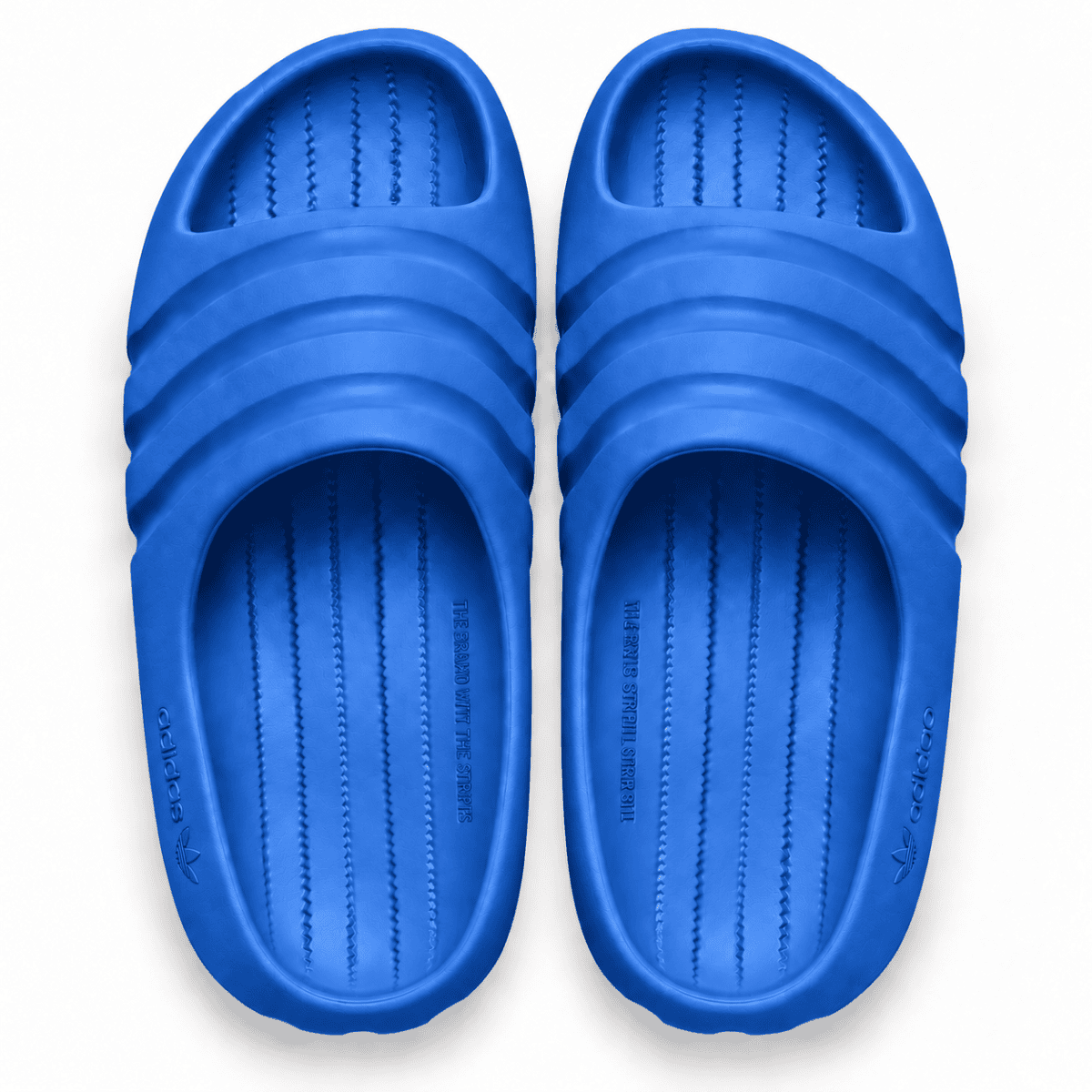 Blue Adidas Adilette Ayoon Slides with Bad Bunny logo on the footbed.