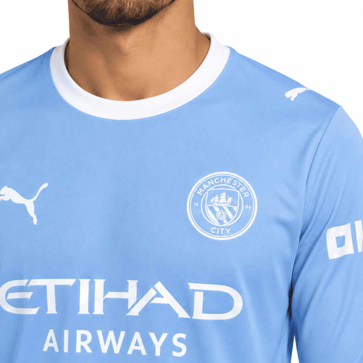Manchester City home long sleeve jersey 2026/27 in light blue with club crest and sponsor logo.