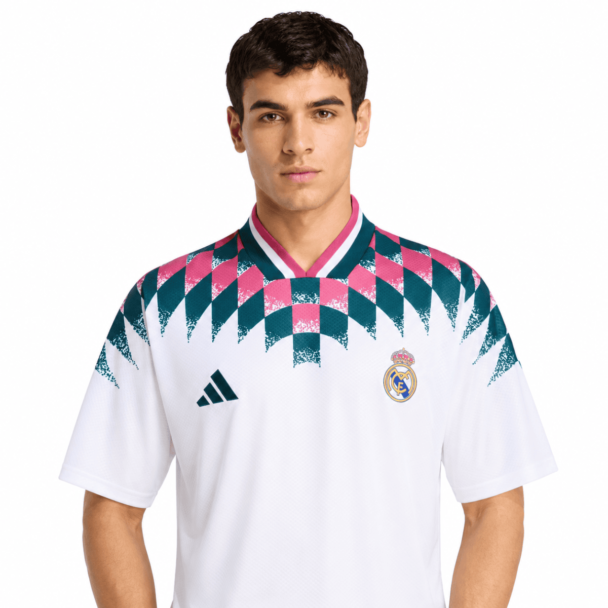 Real Madrid lifestyle jersey with geometric pattern in pink, teal, and white.