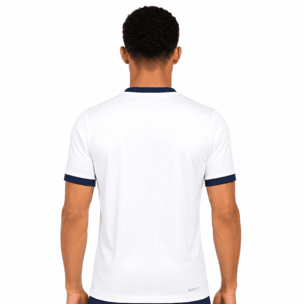 White football jersey with navy collar and sleeve trim, back view.