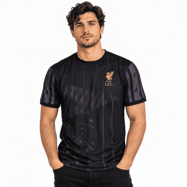 5dec44e6-ec06-4c99-945f-6e78e69ccb51 - UAE SPORT STORE Liverpool FC blackout jersey with gold crest and black design.
