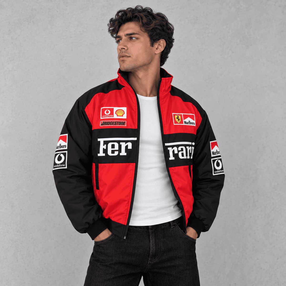 Man wearing a red and black Ferrari racing jacket with sponsor logos.