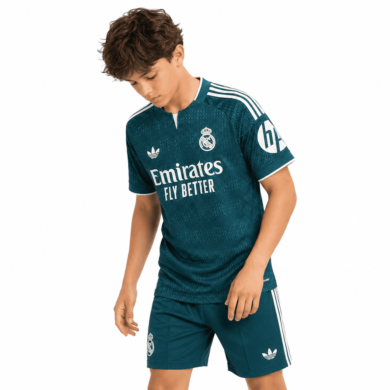 74287aee-6c83-4c95-9ee9-becb1c2050b4 - UAE SPORT STORE Kids away kit of Real Madrid 2026/27 season in blue with white accents.