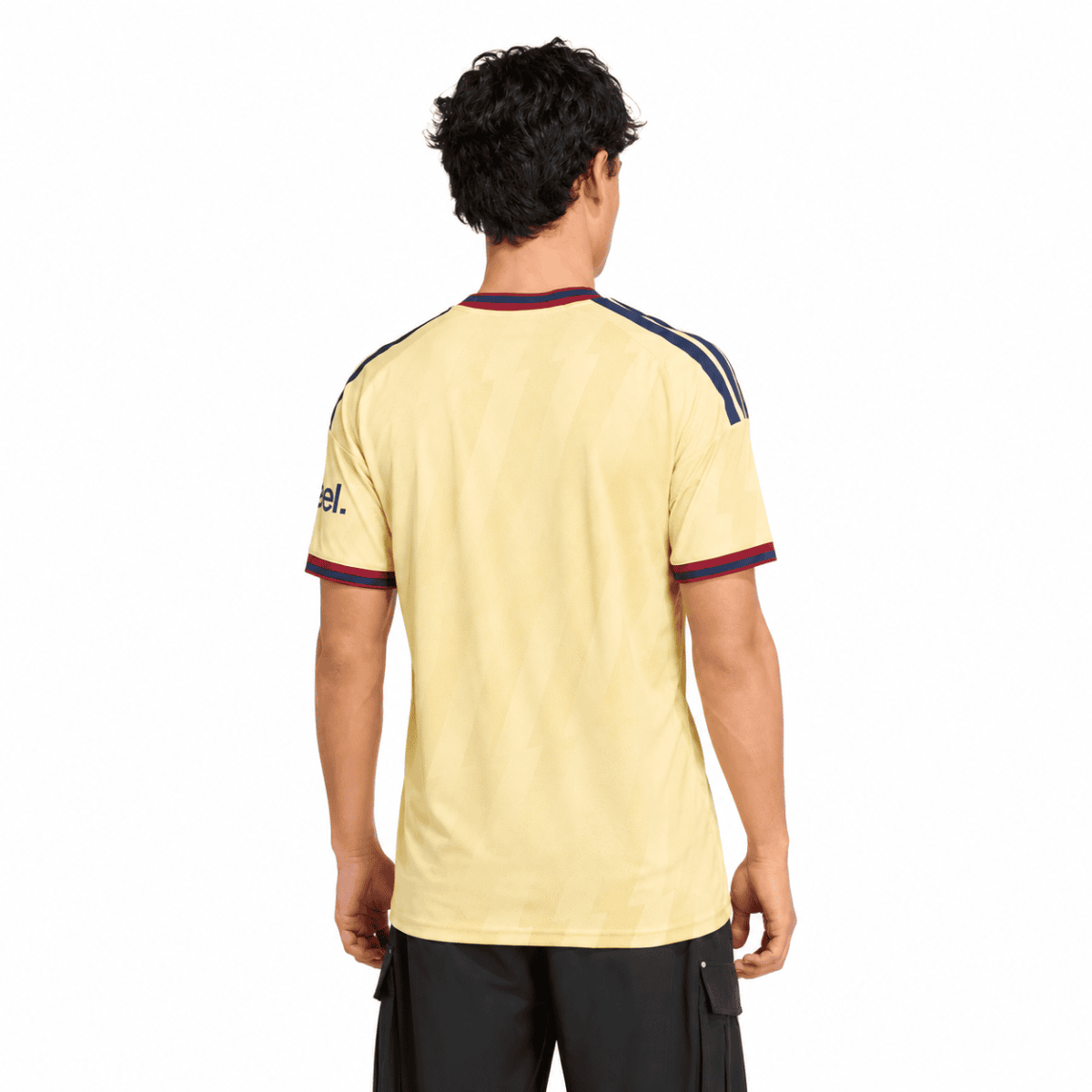 Gunners third jersey 2026/27, yellow with navy and red accents, back view.