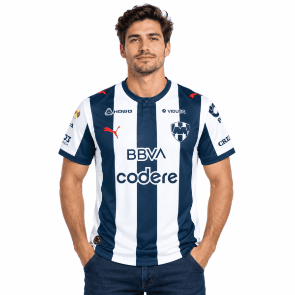 7a0919f8-1558-4a48-9714-20f45d464c8e - UAE SPORT STORE Rayados Monterrey home jersey 26/27 with blue and white vertical stripes and club crest.