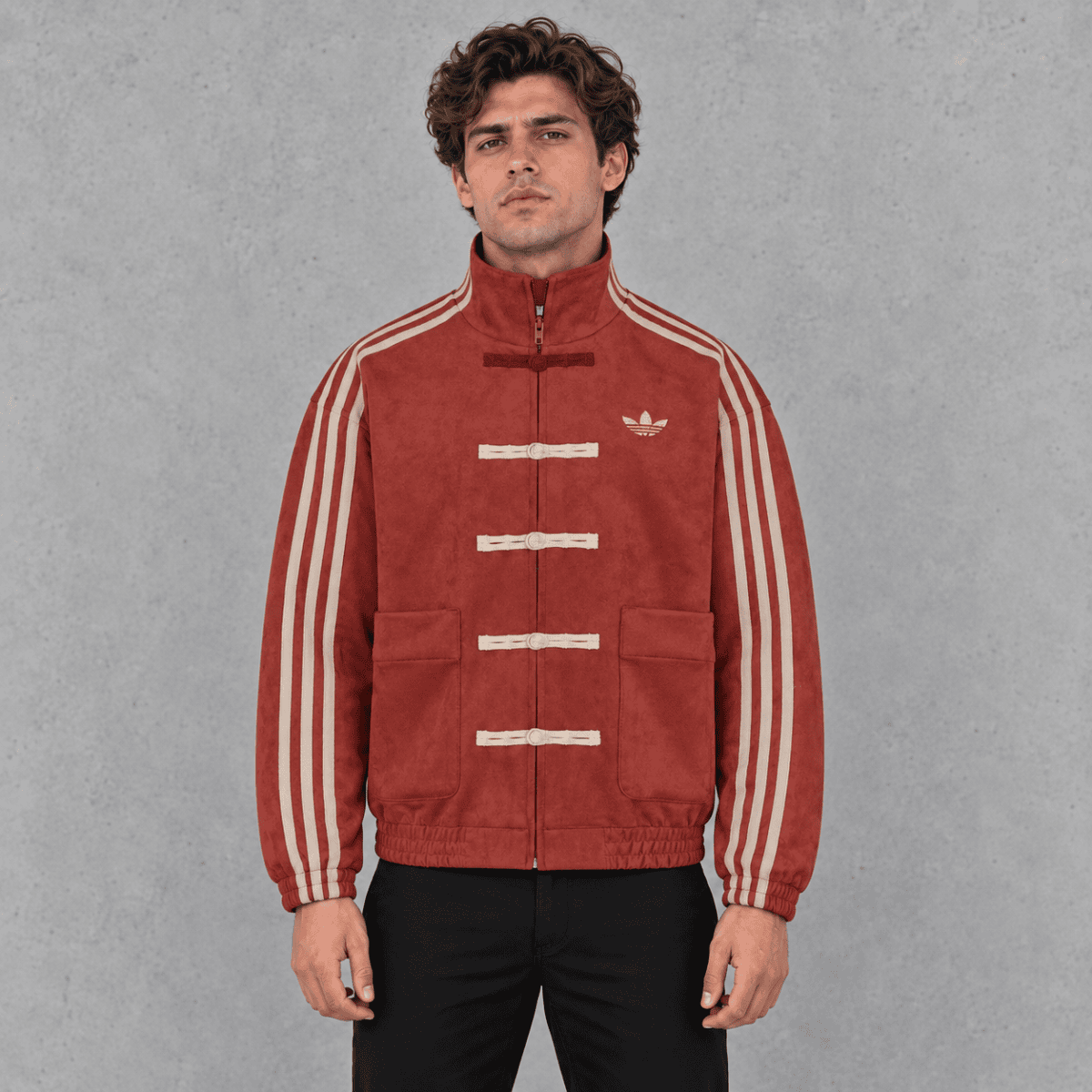 Red Adidas track jacket with beige stripes and logo, men's fashion, front view.