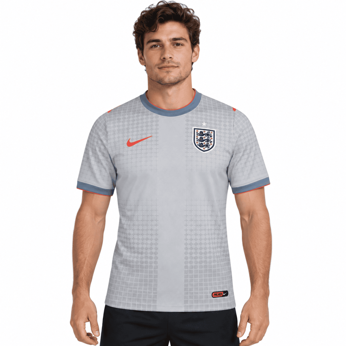 England men's football jersey with crest, Nike logo, and red accents.