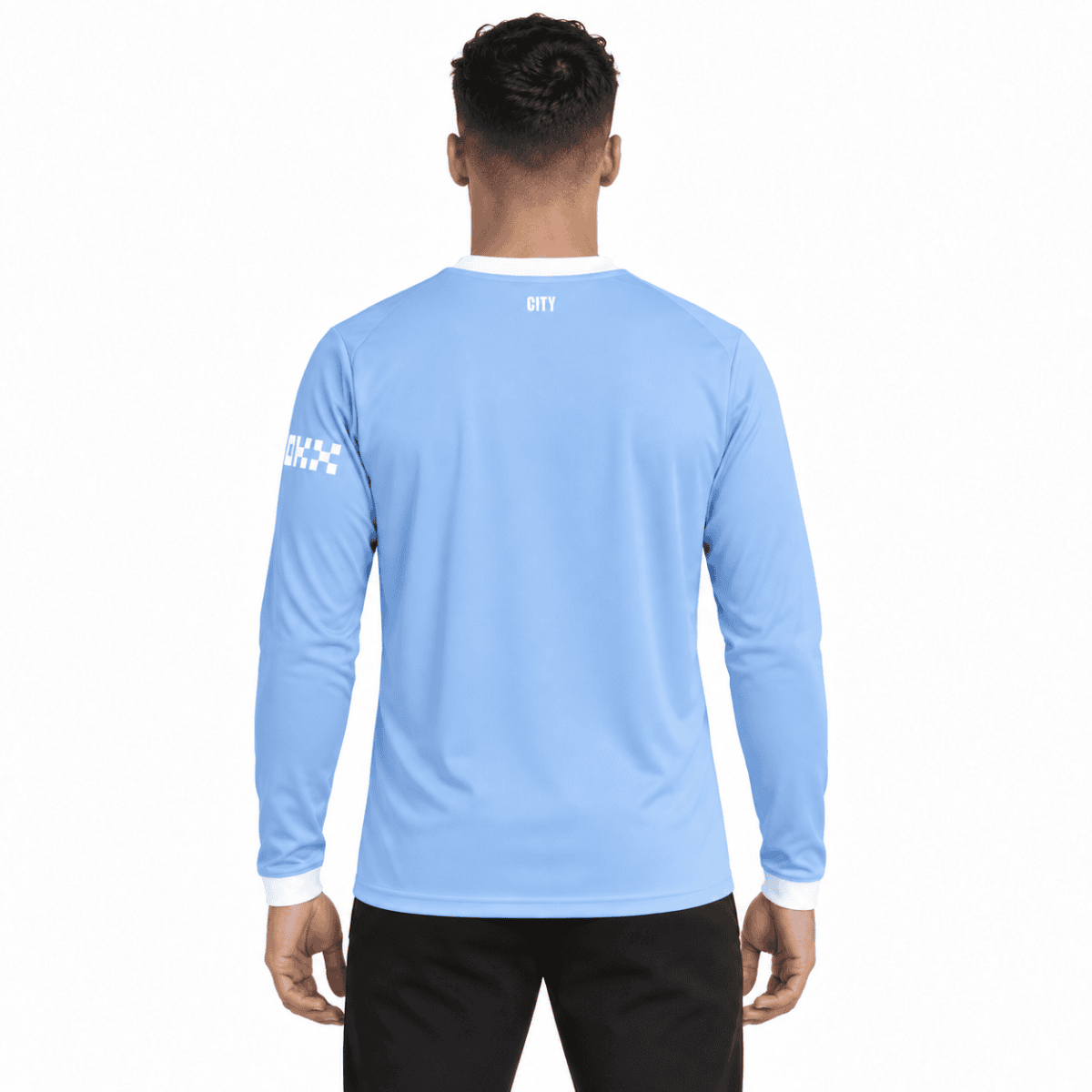 Man City home long sleeve jersey 2026/27 in light blue, back view.