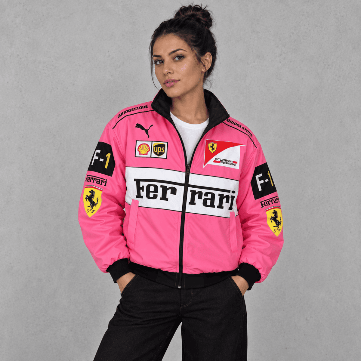 Pink Ferrari Formula 1 team jacket with sponsor logos and Ferrari emblem.