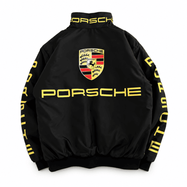 Black Porsche sports jacket with yellow logo and text, long sleeves, front view.