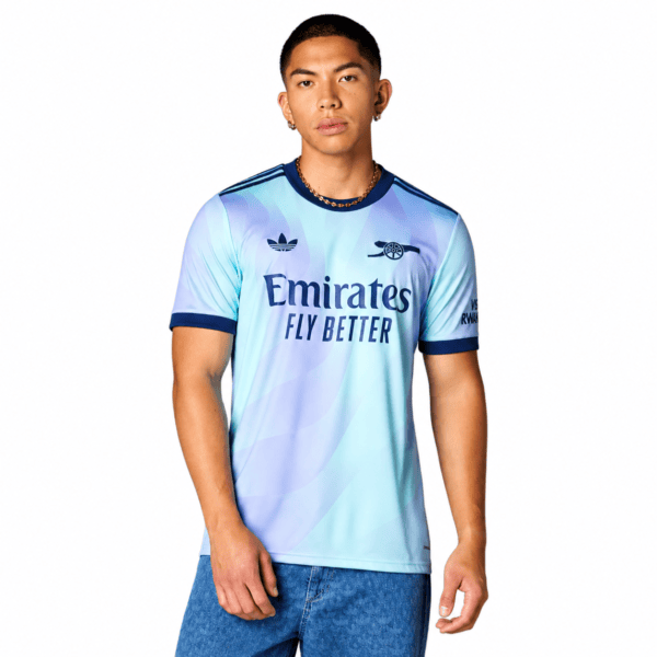 Arsenal third jersey 2024/25 with light blue and dark blue colors, logo visible.