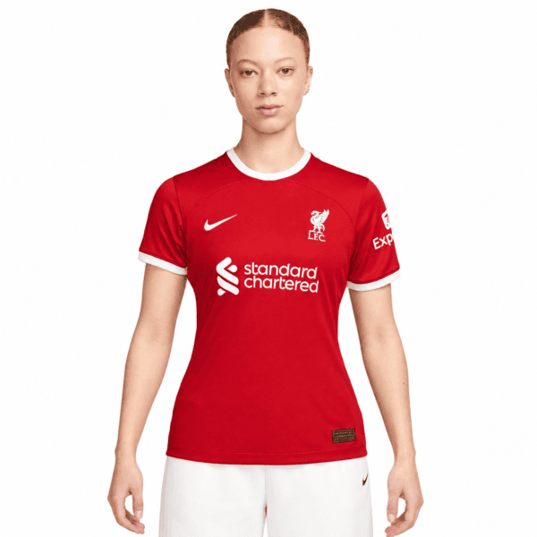 90029cd2-18e8-452e-a4fe-f155fedd4ab1 - UAE SPORT STORE Liverpool Women's home jersey 2023/24 in red with white accents and club logo.